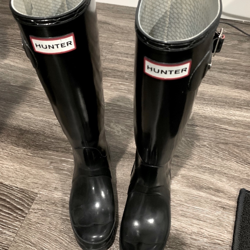 Tall black hunter rain boots